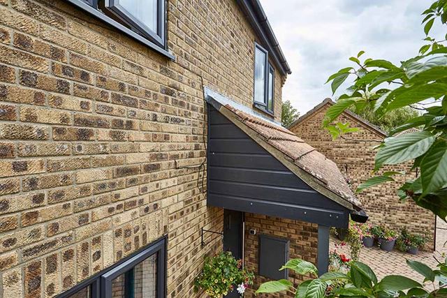 Anthracite grey tongue and groove cladding