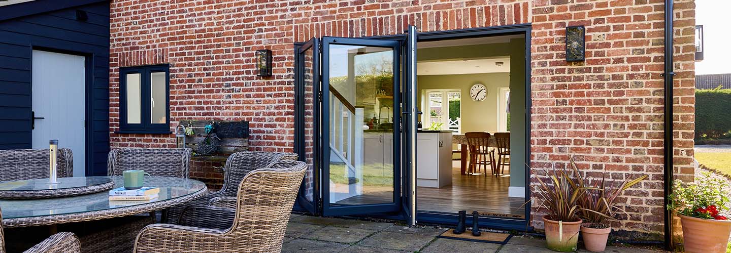 Black aluminium bifold doors banner