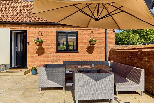 Black aluminium casement window and back door