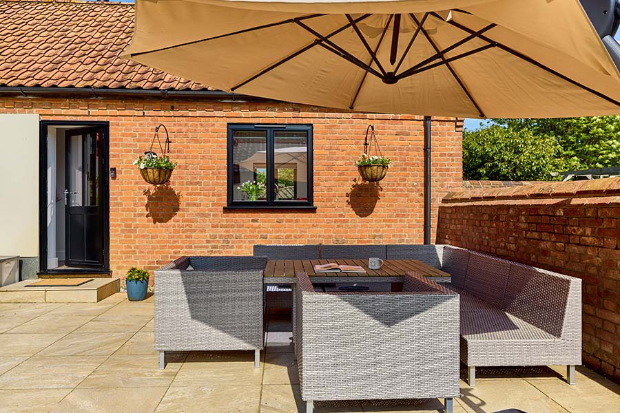 Black aluminium casement window and back door