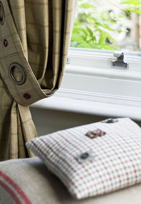 Close up of Chrome sash pull on White wooden sash window from the Anglian sash window range