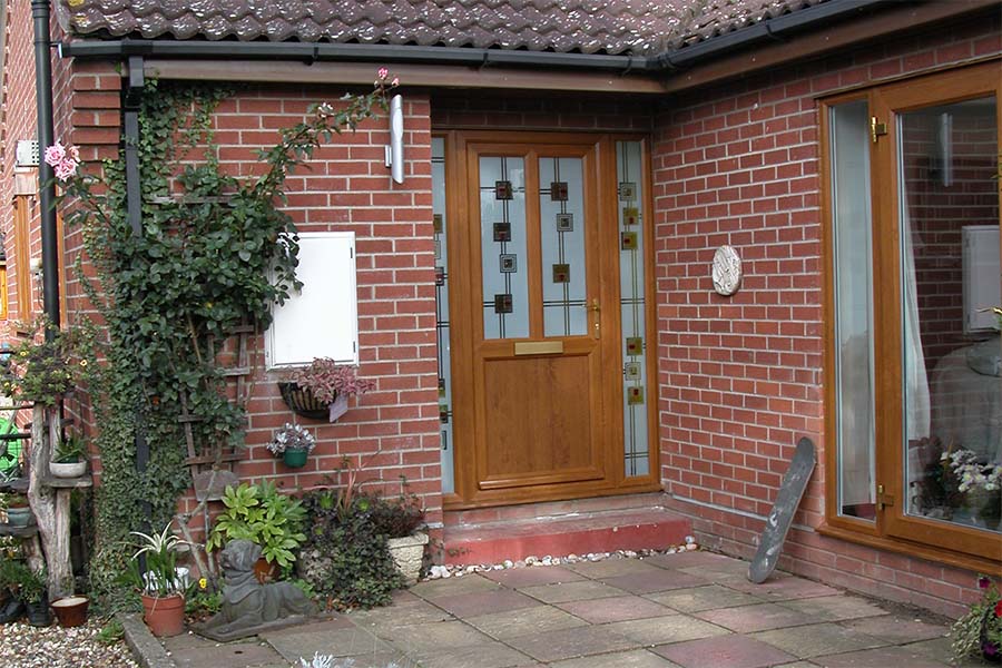 Coloured glass on golden oak front door