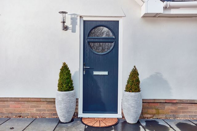 Contemporary composite front door with obscured glass