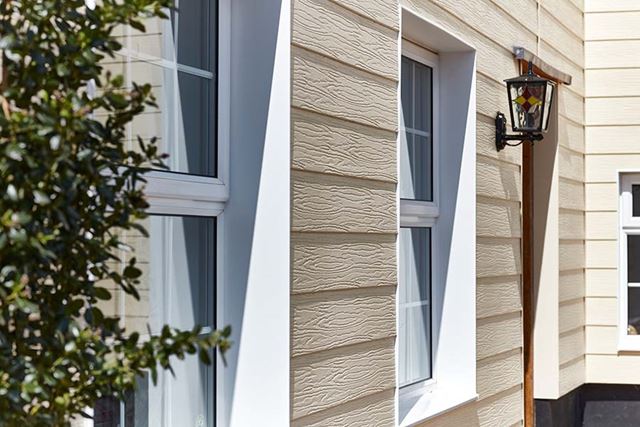 Cream cladding whole house close up