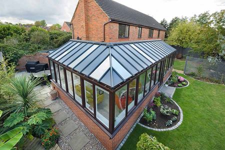 Dark woograin extension with solid panel roof