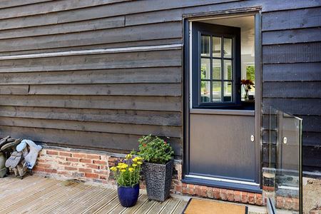 Dual Anthracite grey composite keswick stable door with cottage bars