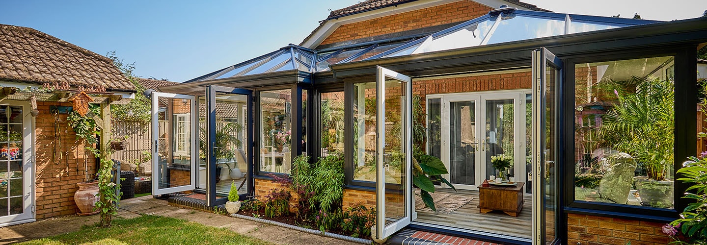 Dual anthracite grey twin Edwardian conservatory with French doors bannerupdated