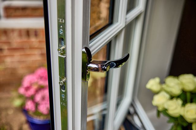Dual Anthracite grey uPVC flush window handle close up