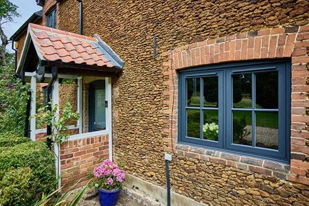 Dual Anthracite grey uPVC flush window with cottage bars
