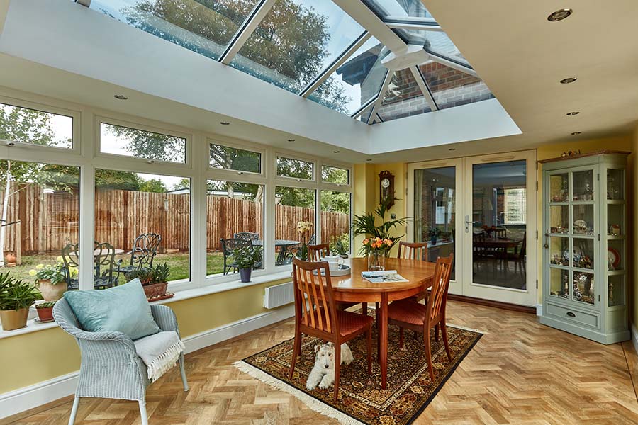 Dual Cream contemporary orangery with solarroof