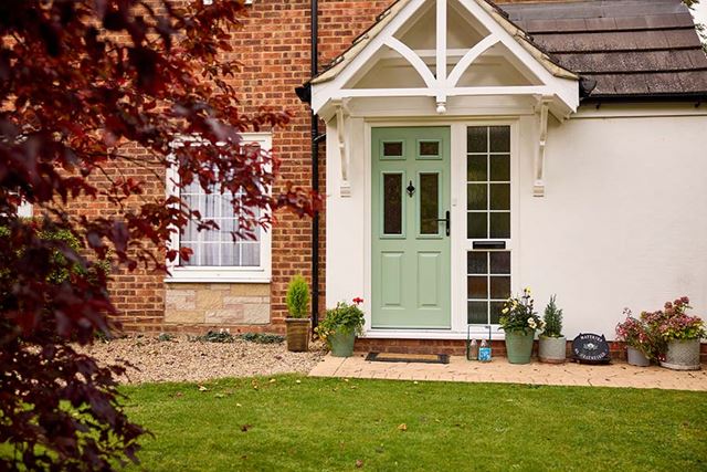 Elite sage green composite door with obscure glass