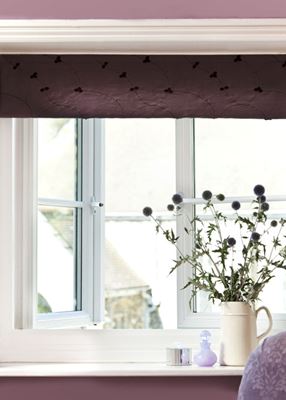 UPVC casement window with flying mullion finished in White with White window handles and cottage bars