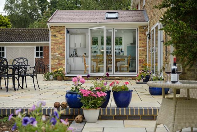 Gable end extension with replica tiled roof and bifold doors