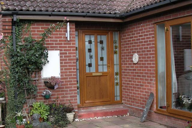 golden oak front door with fusion glass
