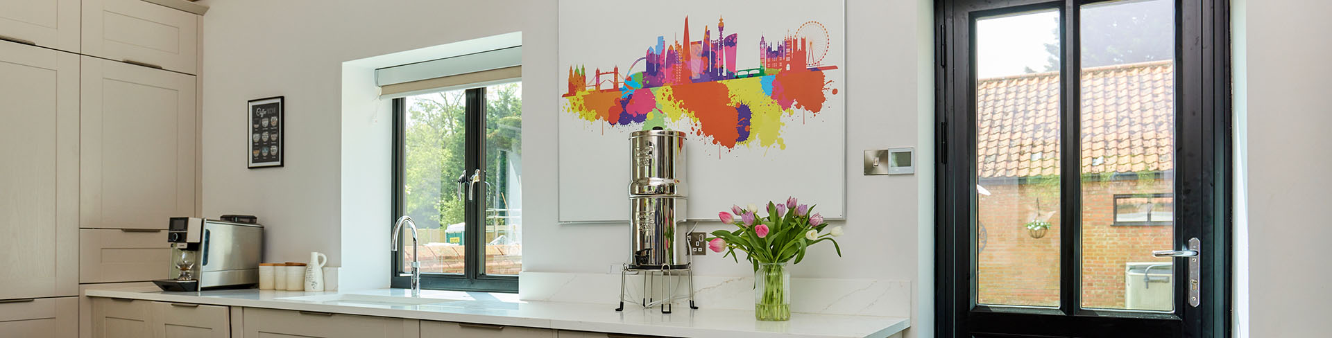 Jet black aluminium window and door in kictchen banner