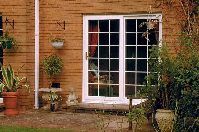 Patio door with decorative glass