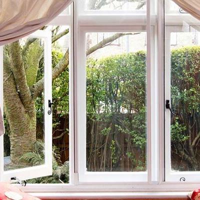 White secondary glazing on living room window from the Anglian secondary glazing range