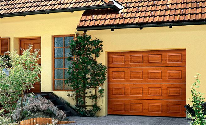 Georgian sectional garage door with smooth woodgrain finish