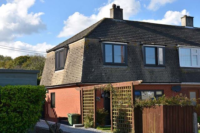 uPVC flush windows in dual black ash whole house