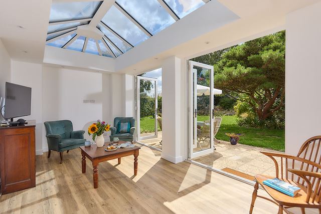 uPVC white knight classic Orangery pelmet with black door handles interior