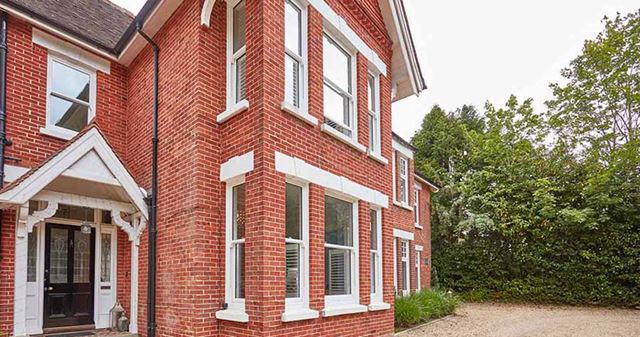 White sliding sash uPVC windows whole house