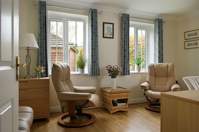 white upvc casement window with Georgian bar inserts interior