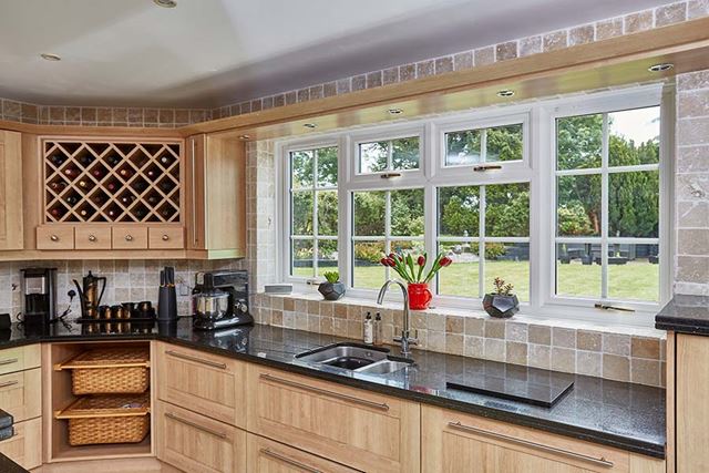 White uPVC casement window with Georgian bars in kitchen