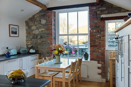 White uPVC casement window with vertical cottage bars interior