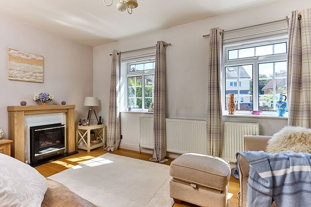 White uPVC casement windows with Georgian inserts living room interior