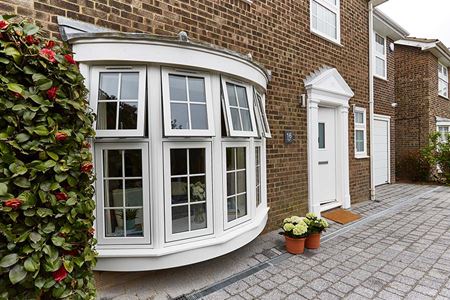 White uPVC flush bay window in open position