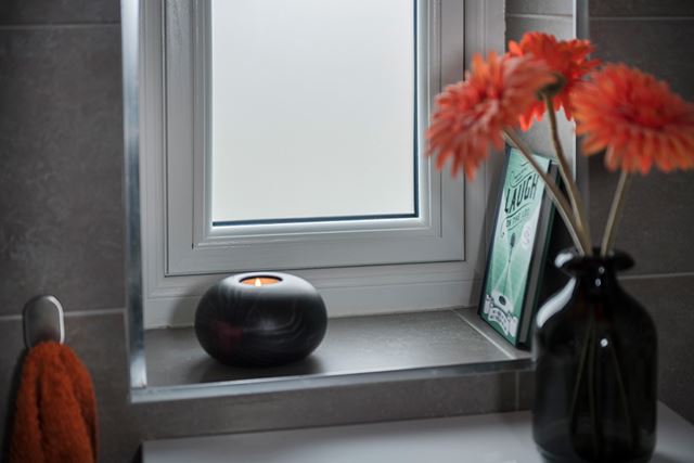 White uPVC flush casement window with obscure glass in bathroom