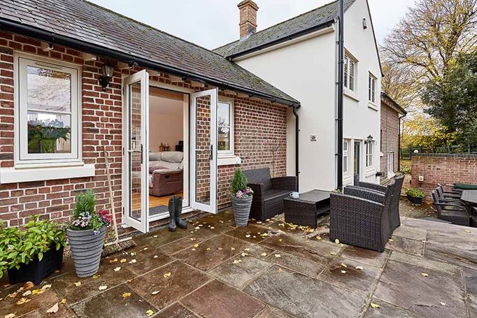 White uPVC flush windows and french doors