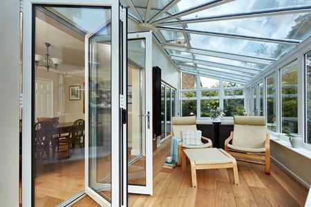 White Knight uPVC lean-to victorian conservatory with bi fold doors
