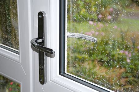 White uPVC Porch Window interior view whilst raining