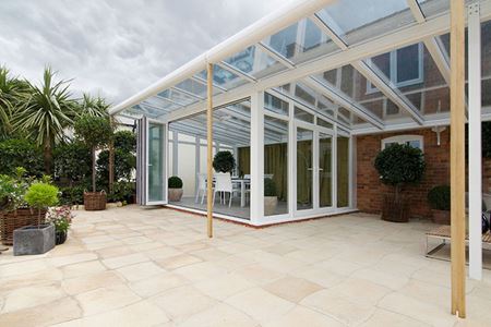 Garden Room Veranda in White PVC-U with Bi-Folding Doors
