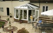 UPVC Victorian conservatory in White Knight with tilt and turn windows and French doors from Anglian Home Improvements