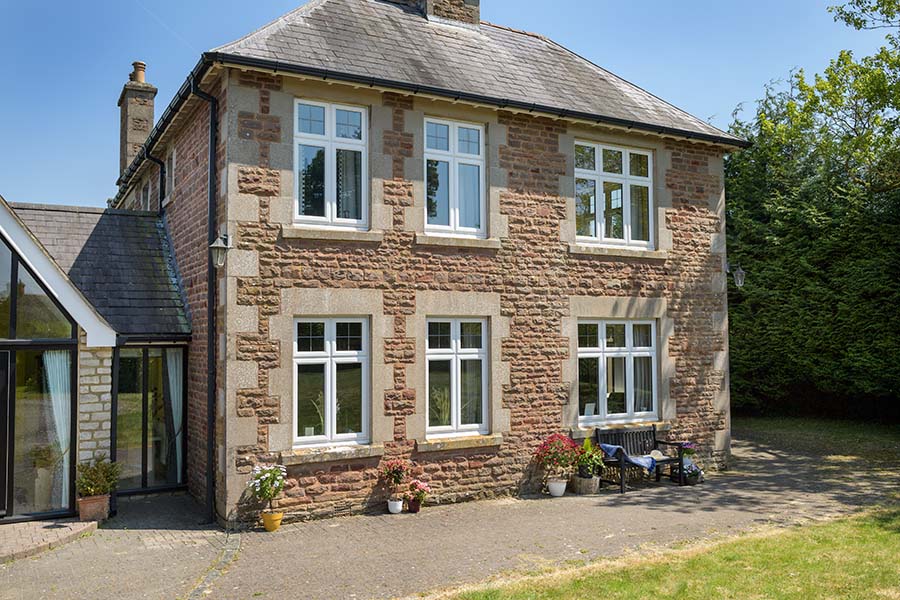 White woodgrain uPVC casement window whole house