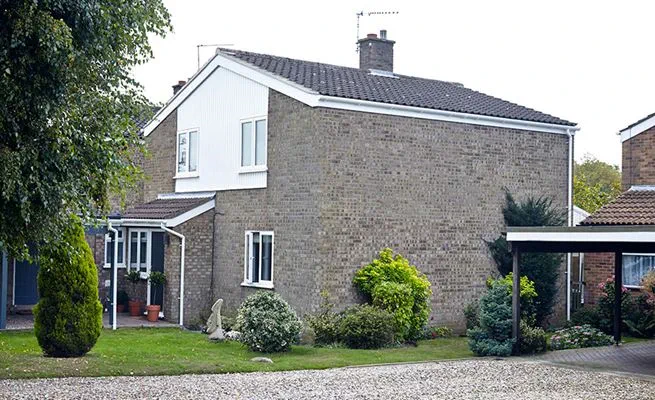 Whole house rooftrim renovation including White uPVC exterior cladding from the Anglian cladding range